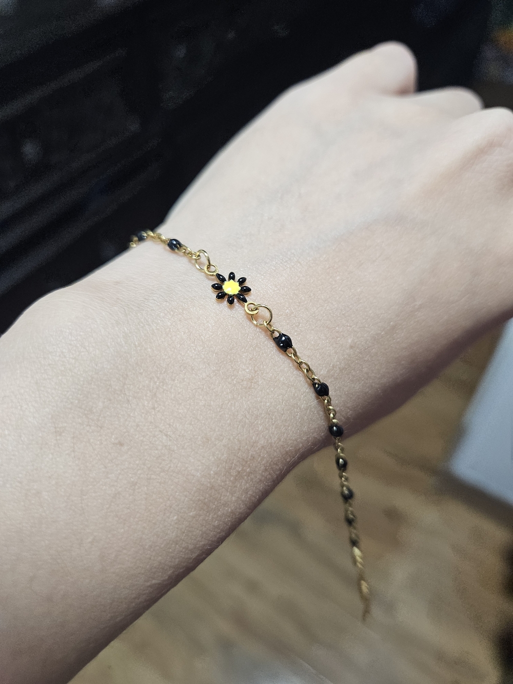 Bracelet with Black and Yellow Flower Accent